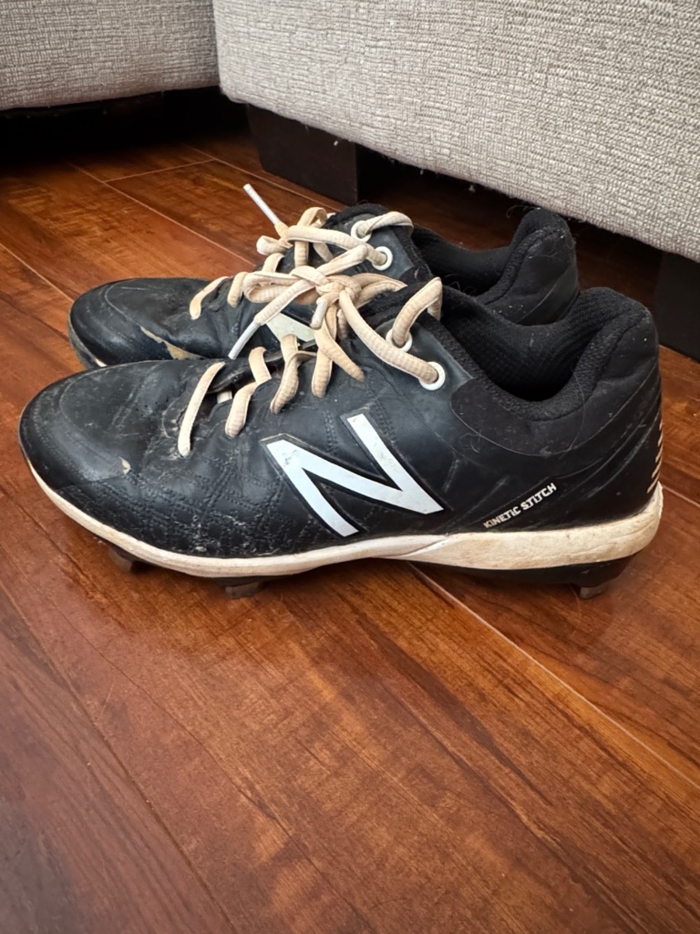 New Balance Men’s Black and White Athletic Cleats